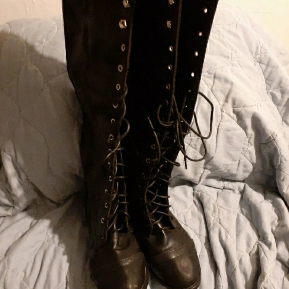 Black leather knee high boots